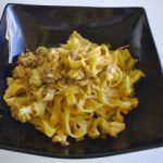 Tagliatelle con broccoli, vongole e uvetta