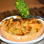 Corona di trota salmonata con pesto di rucola e arachidi